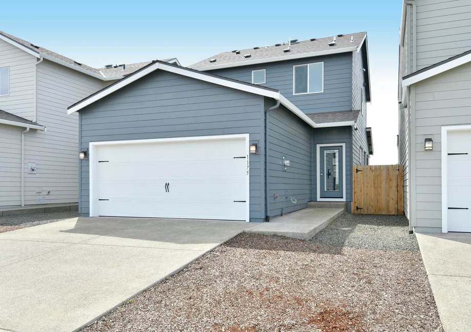 McKenzie model home at Dove Landing — rear exterior (real photo)